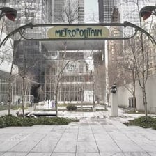 A Paris Métro station entrance with its distinctive sign.