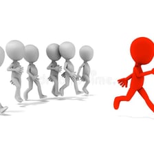 A runner leading competitors in a race