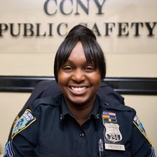 A police officer helping maintain order in a public setting