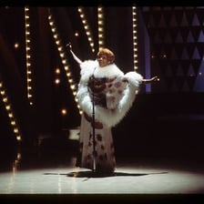Aretha Franklin performing on stage