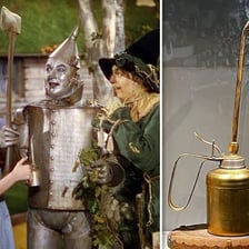 The Tin Man holding an oil can in The Wizard of Oz