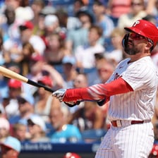 A baseball leadoff batter reaching first base after a hit
