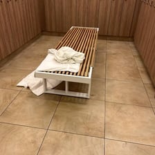A towel hanging in a gym locker room