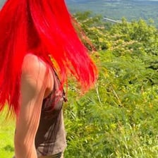 A person with bright red hair