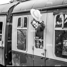 A person waving goodbye