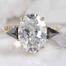 Several faceted diamonds displayed together