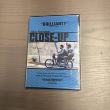 A blue-labeled Blu-ray disc