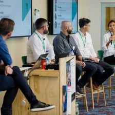 A panel of specialists discussing a subject.