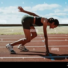 A runner preparing at a starting line