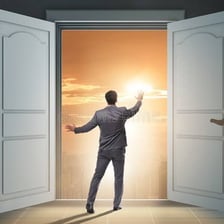 A person walking through a doorway