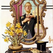 A person adjusting their appearance while looking in a mirror.
