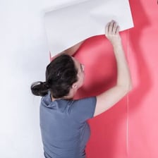 A sheet of paper stuck to a wall with paste