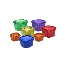A person distributing measured portions into separate containers