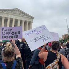 An authority figure stopping or suppressing a public protest