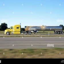 A large semitrailer truck traveling on a highway