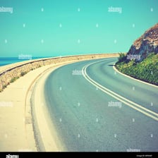 A road curving around a bend.