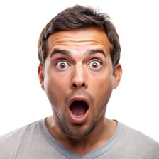 A surprised person reacting to something extraordinary.