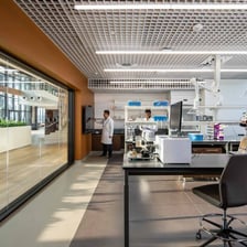A laboratory with workbenches and scientific equipment.