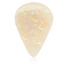 A milky white opal gemstone showing subtle color flashes.