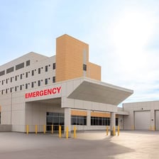 An entrance sign for a hospital emergency room.