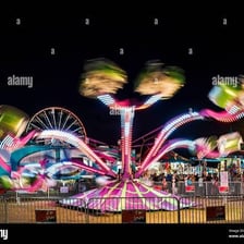A brightly lit carnival amusement ride