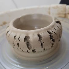 A visible crack showing a flaw in a ceramic object