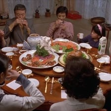 A person eating an evening meal at a table
