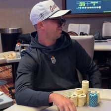 Poker chips placed into a pot before a hand begins