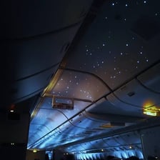An airplane cabin during an overnight flight