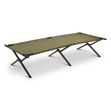 A simple cot in a military barracks