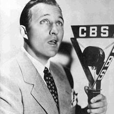 Bing Crosby performing as a singer with a microphone.