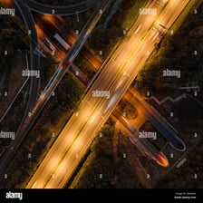 Two roads joining together into a single road.
