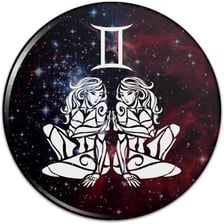 The Gemini zodiac symbol depicting twins.