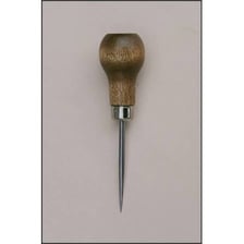 An awl making a hole in a piece of leather