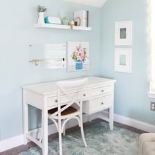 A clean and orderly desk with objects arranged neatly