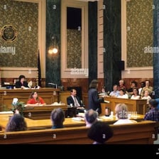 A group of jurors seated in a courtroom jury box