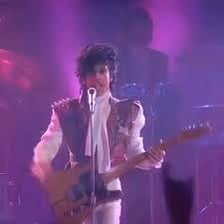 Prince performing “Let's Go Crazy” during the Purple Rain era