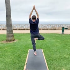 A person performing a yoga pose.