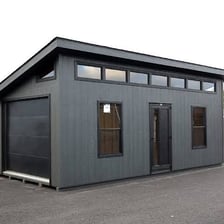 A residential garage sized for one car.