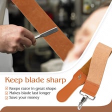 A barber drawing a straight razor across a leather strop