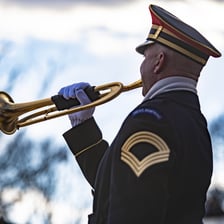 A bugler performing the ceremonial tune Taps