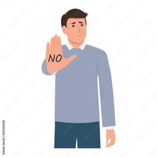 A person refusing something with a raised hand.