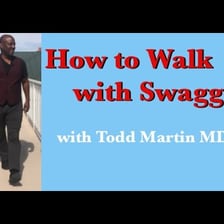 A person walking with an exaggeratedly confident posture.