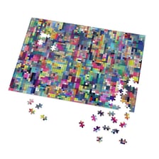 A challenging jigsaw puzzle spread across a table