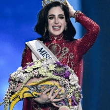 A beauty pageant winner wearing a jeweled tiara