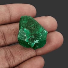 A green emerald gemstone