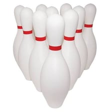 A bowling lane leading toward a set of pins