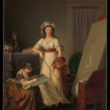 An artist painting an inspiring model in a studio