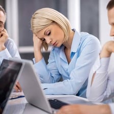 A listener looking bored during a long conversation