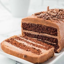A slice of rich layered chocolate torte
